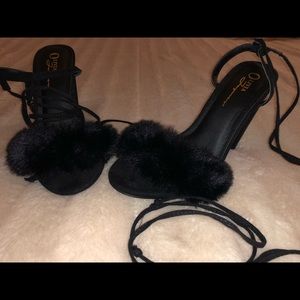 Chunky heel.fuzzy front.